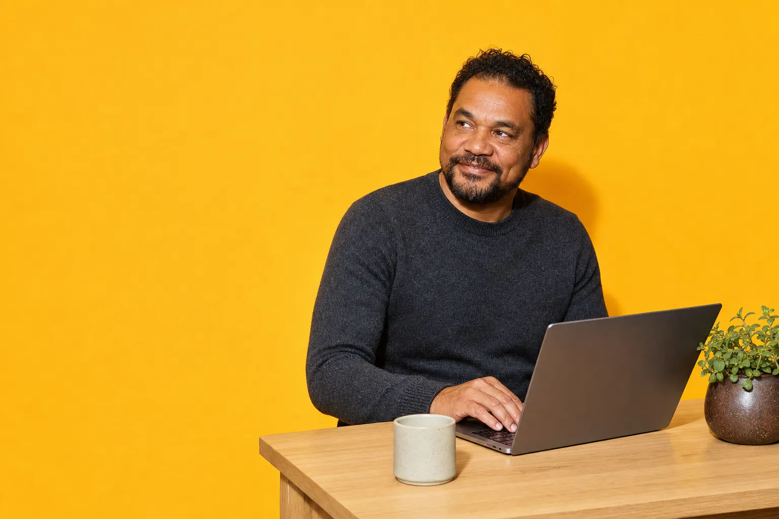 A broker at a laptop, deciding